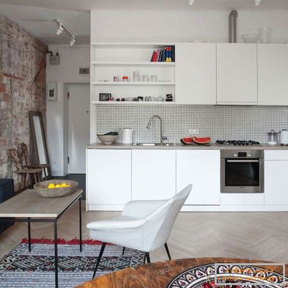 Elegante diseño de un apartamento de una habitación - cocina combinada