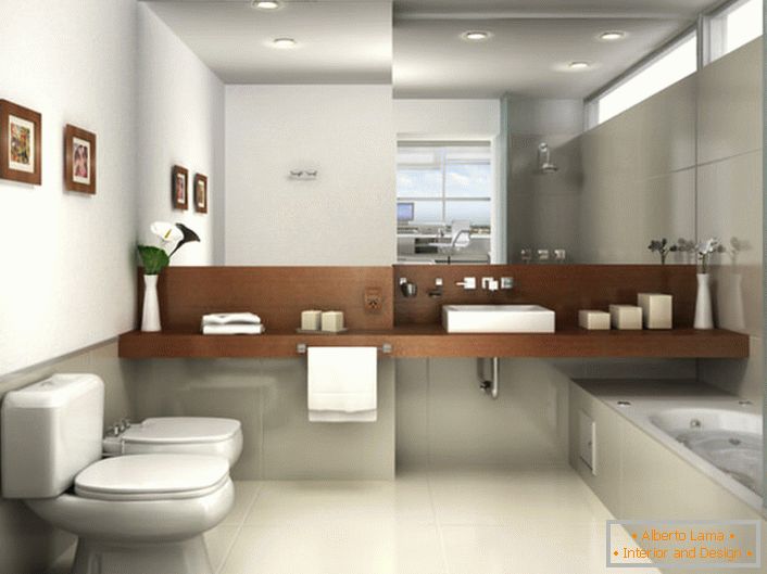 El baño en el estilo del minimalismo está decorado en tonos gris claro. La vista es atraída por un gran espejo que ocupa toda la pared sobre el lavabo.