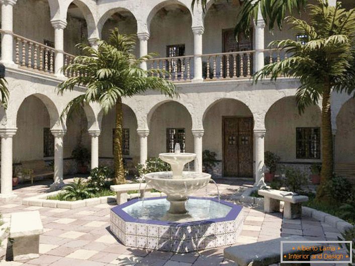 La mejor decoración para un patio en el estilo mediterráneo es una fuente. Elegante fuente de múltiples niveles de pequeñas dimensiones en el área de recreación.
