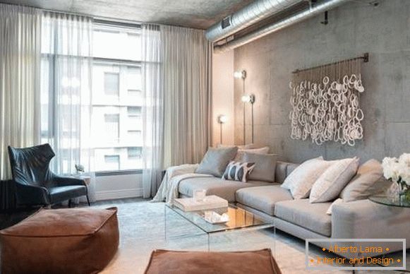 Diseño de la sala de estar en un apartamento en el estilo loft
