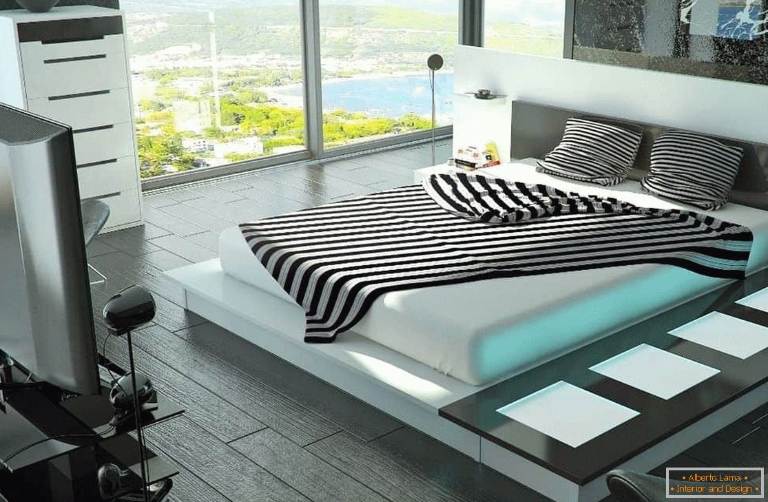 Dormitorio con una cama grande con iluminación de alta tecnología