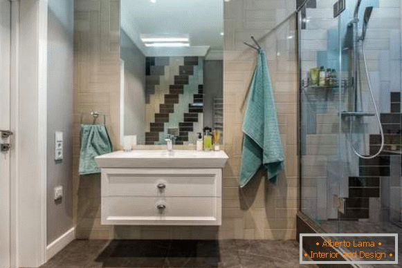 Hermoso diseño de baño con azulejos inusualmente colocados