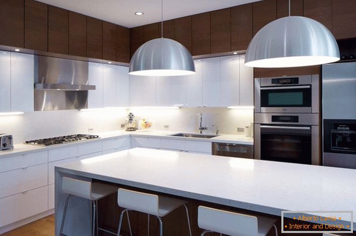 Solución de diseño en el estilo del minimalismo para una cocina amplia y luminosa. 