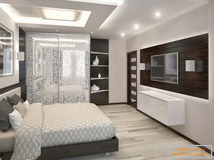 Habitación amplia y luminosa en un estilo de alta tecnología. Los muebles correctamente combinados se combinan orgánicamente con los elementos de decoración.
