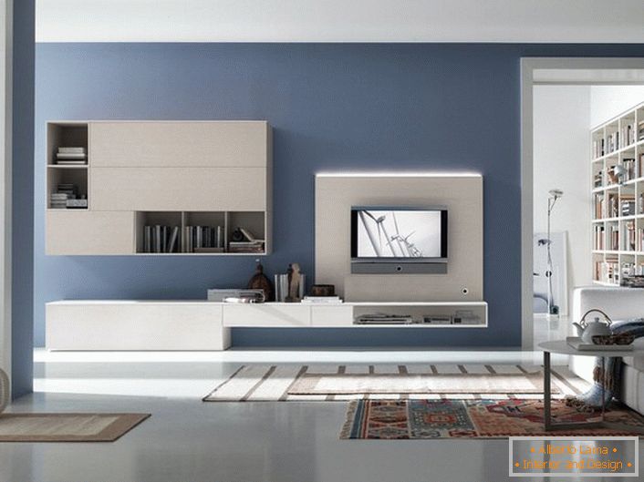 Los muebles para el interior en el estilo de alta tecnología deben ser funcionales y elegantes. Muchas oficinas, estantes abiertos en la parte con bisagras de los auriculares para la sala de estar hacen que los muebles sean espaciosos. 
