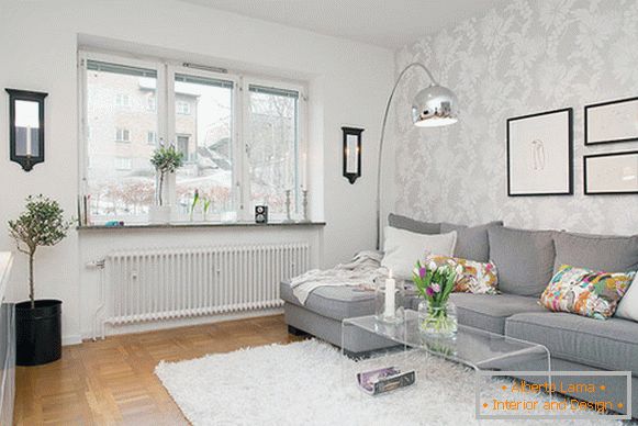 Sala de estar de un pequeño apartamento en Gotemburgo