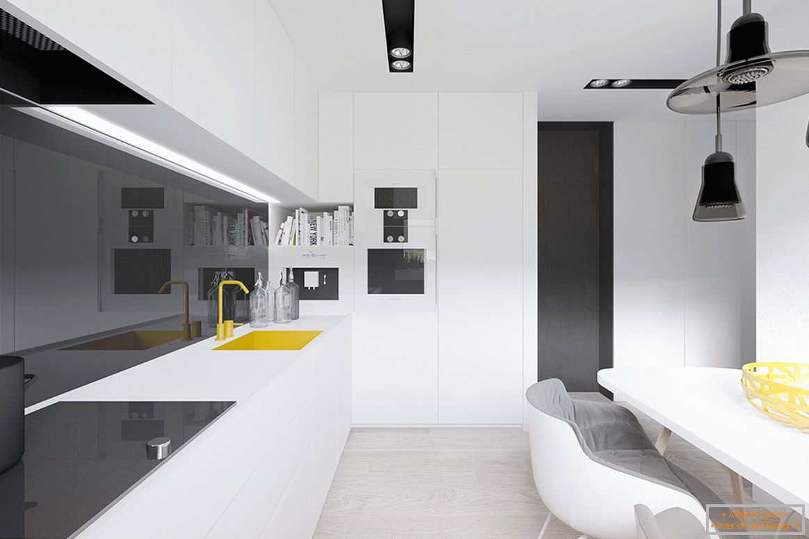Acentos amarillos en el interior de la cocina en blanco y negro
