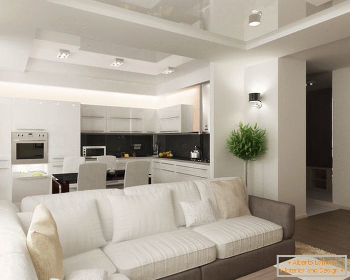 La combinación de cocina y sala de estar se considera una solución efectiva en condiciones de espacio insuficiente. 