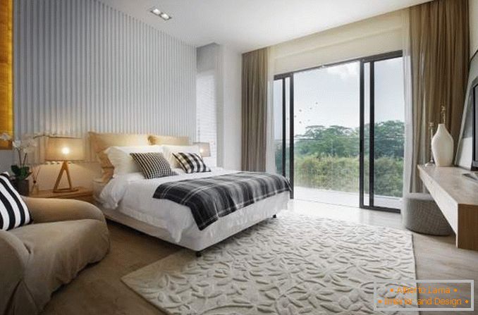 Dormitorio con ventanas panorámicas - foto de un hermoso interior