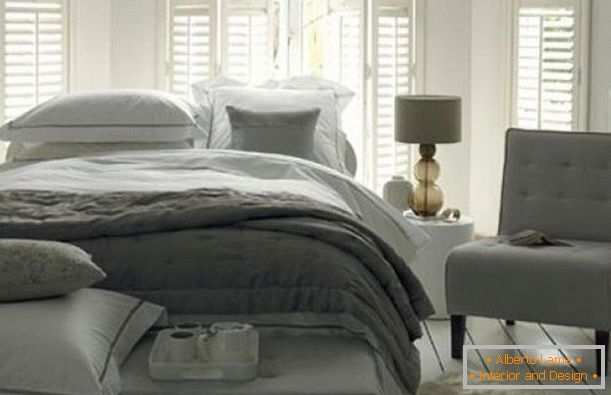 Dormitorio interior en tonos grises