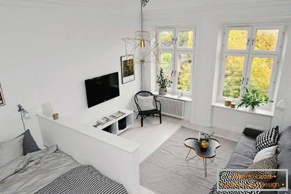 Apartamento de una habitación en estilo escandinavo - sala de estar y dormitorio