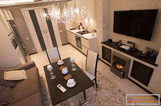 Diseño interior de un apartamento de dos habitaciones para una familia - una foto de una sala de estar con chimenea