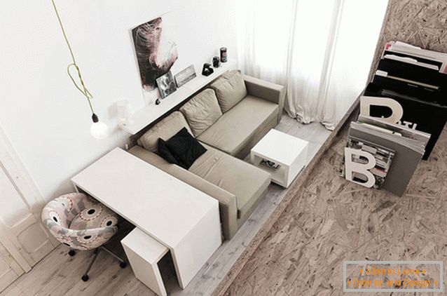 Sala de estar de un estudio de dos pisos en Polonia