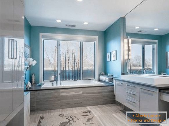 Interior del cuarto de baño en colores azul y gris photo