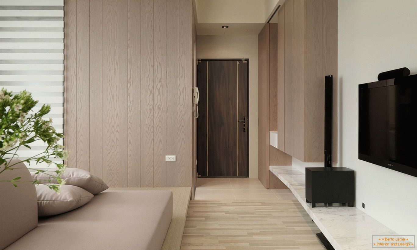 Decoración de madera en el interior de un pequeño apartamento de una habitación