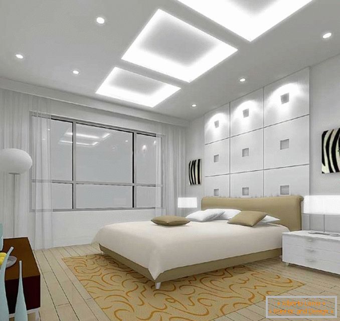 Iluminación incorporada y lámparas en las mesitas de noche en el dormitorio