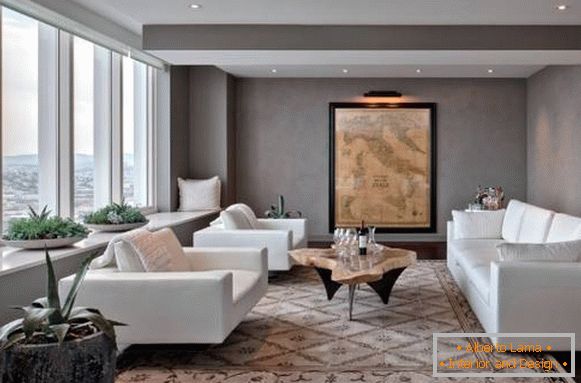 El diseño de la sala de estar con muebles blancos - una foto con paredes grises