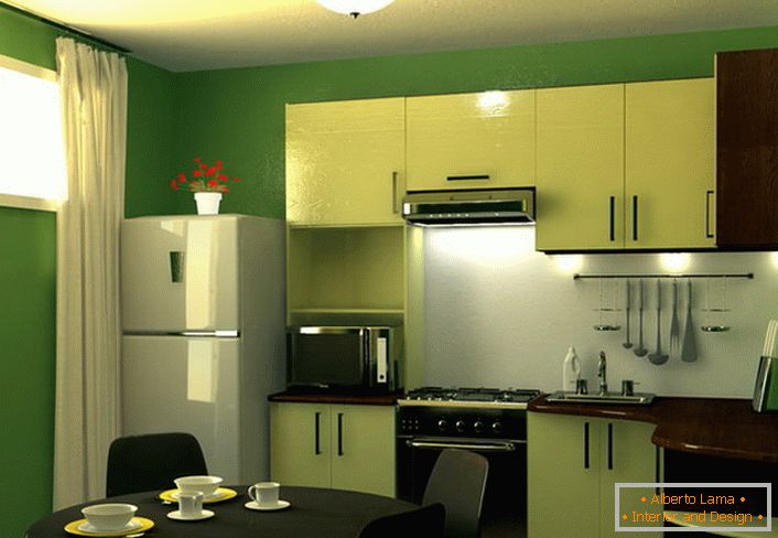 El verde es el color de la tranquilidad y la armonía. Área de cocina de 9 m2 en este esquema de color: una excelente solución para el diseño de cualquier apartamento de la ciudad.
