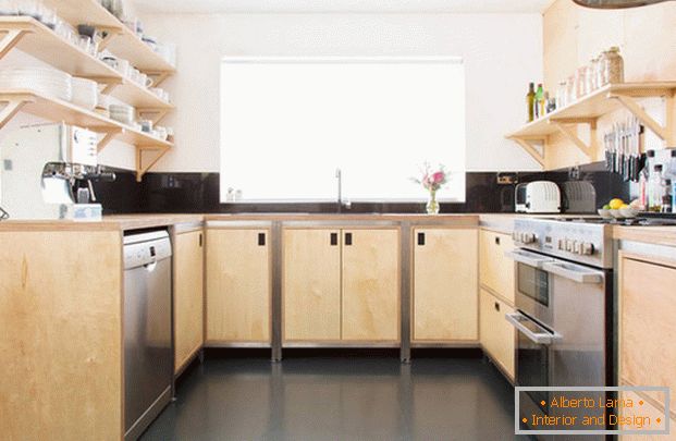 красивый diseño de la esquina de la cocina en una casa privadaфото