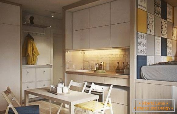 El diseño de moda del departamento de una habitación de 40 sq. M - la foto de la cocina y el dormitorio
