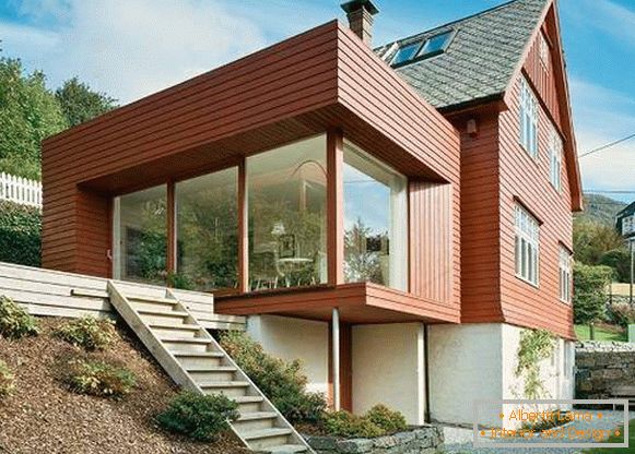 Hermosas casas de madera en estilo de alta tecnología