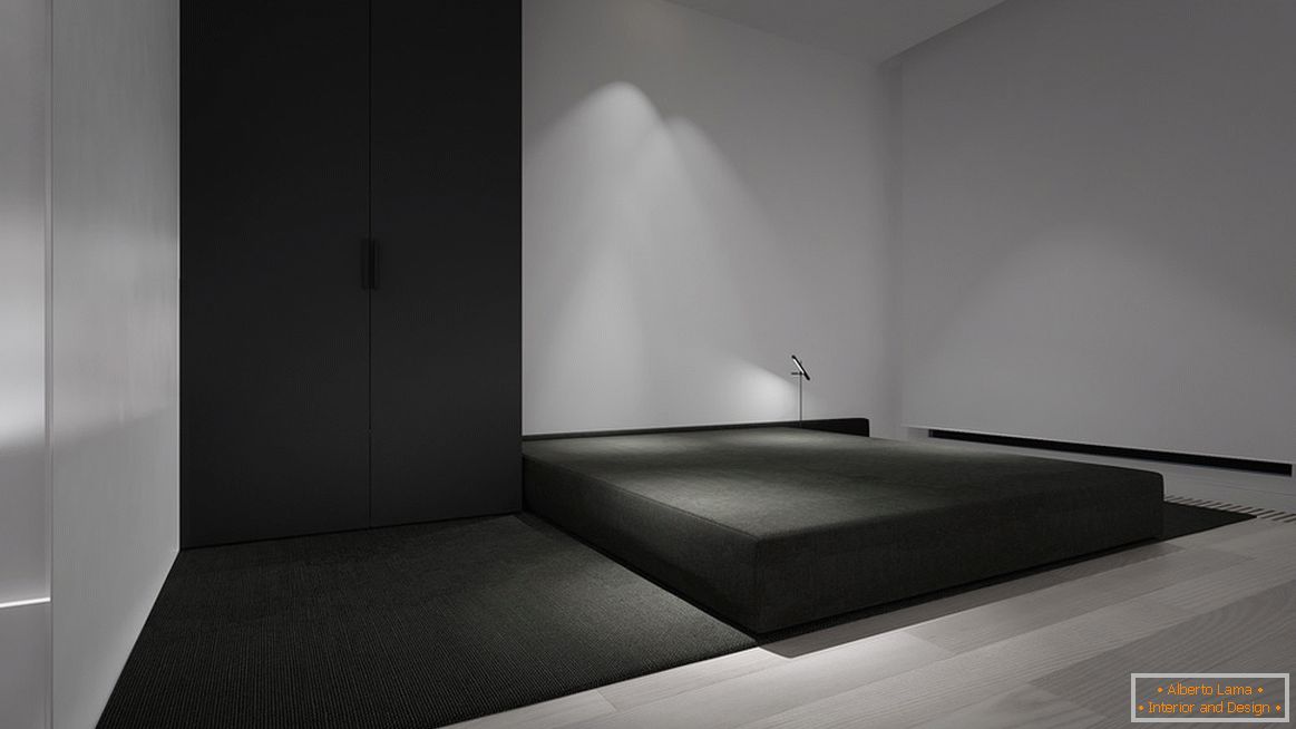 Un dormitorio en el estilo del minimalismo es el ejemplo más brillante de una característica de diseño. La característica principal es un mínimo de muebles.