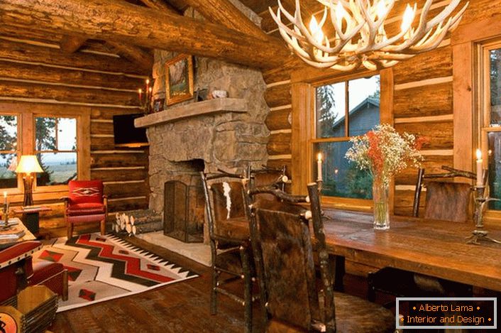 Un diseño elegante de un pabellón de caza en un estilo rústico crea una atmósfera de confort hogareño.
