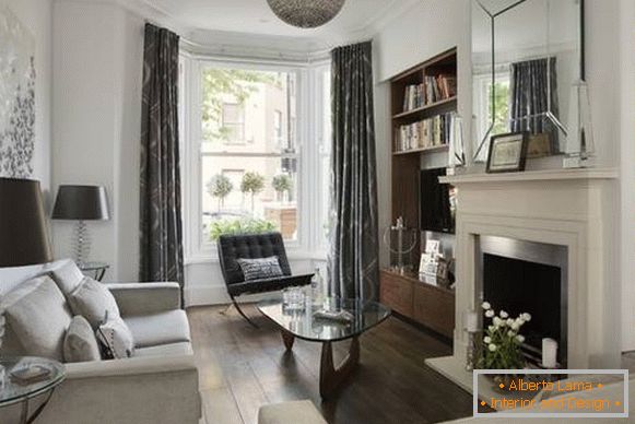 Hermoso diseño de la sala de estar - una foto con una ventana salediza