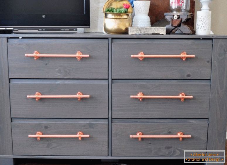 cute-pink-acent-at-diy-drawer-which-is-painted-in-cool-gray-and-made-of-wood-element-created-as-tv-cabinet-on-madera-flooring