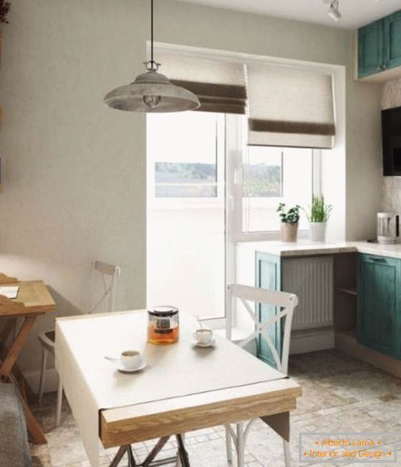 Diseño de cocina con balcón en un pequeño apartamento estudio - foto