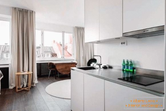 Diseño de cocina en un pequeño apartamento estudio - foto minimalista