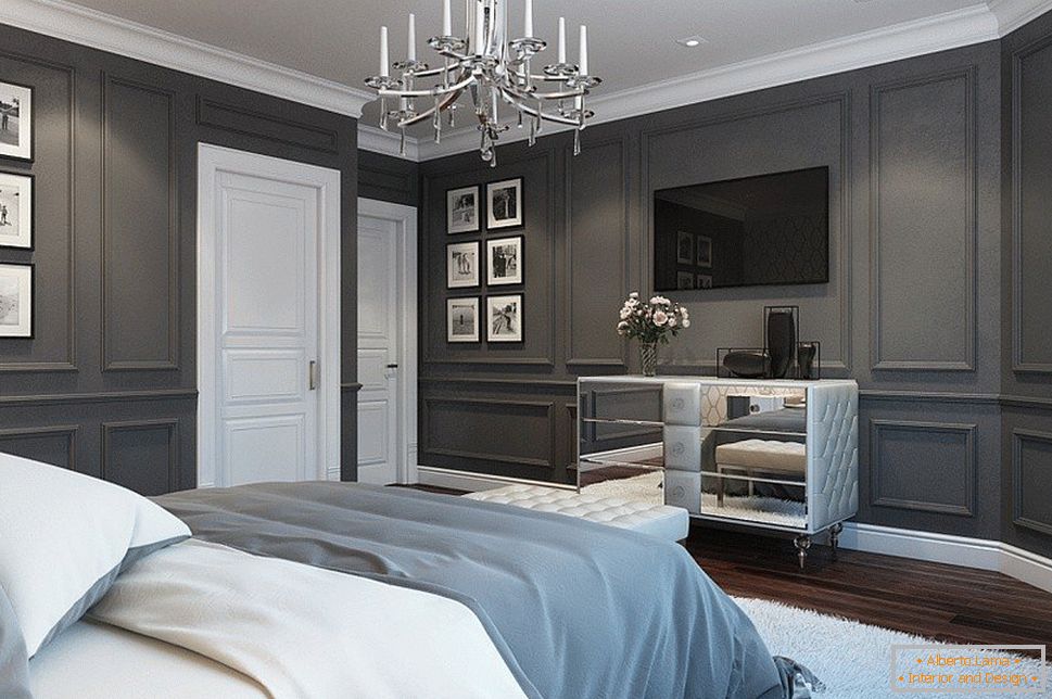 Molduras pintadas en un dormitorio con paredes grises