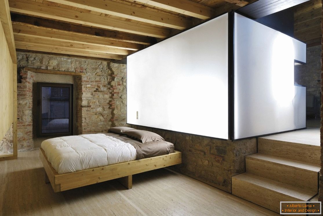 Dormitorio en una casa de madera en Brescia