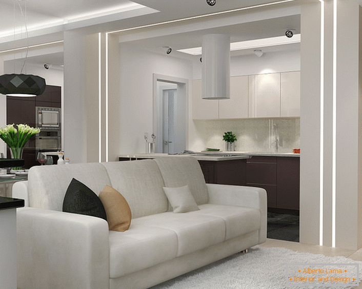 Una pequeña sala de estar en el estilo de minimalismo en el apartamento estudio. La funcionalidad y el atractivo del interior en este estilo lo hacen irremplazable cuando se trata de la disposición de un espacio residencial pequeño.