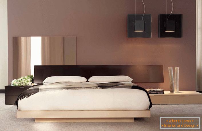 Un diseño minimalista con notas de color japonés en el dormitorio de un apartamento francés común. 