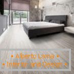 Dormitorio con piso de parquet de colores claros