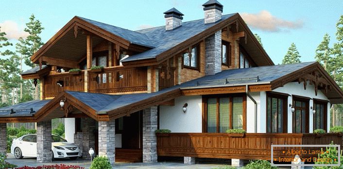 El proyecto de una casa en el estilo de un chalet es una variante ideal de bienes raíces suburbanos.