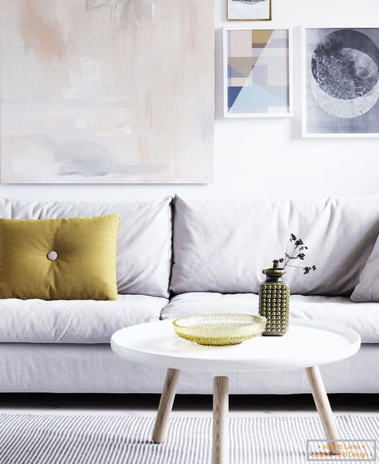 picturesque-modern-living-room-design-with-massive-artistic-picture-and-comfy-white-couch-also-small-white-round-coffee-table-combined-oak-foot-for-scandinavian-design- blogs-scandinavian-design-blog
